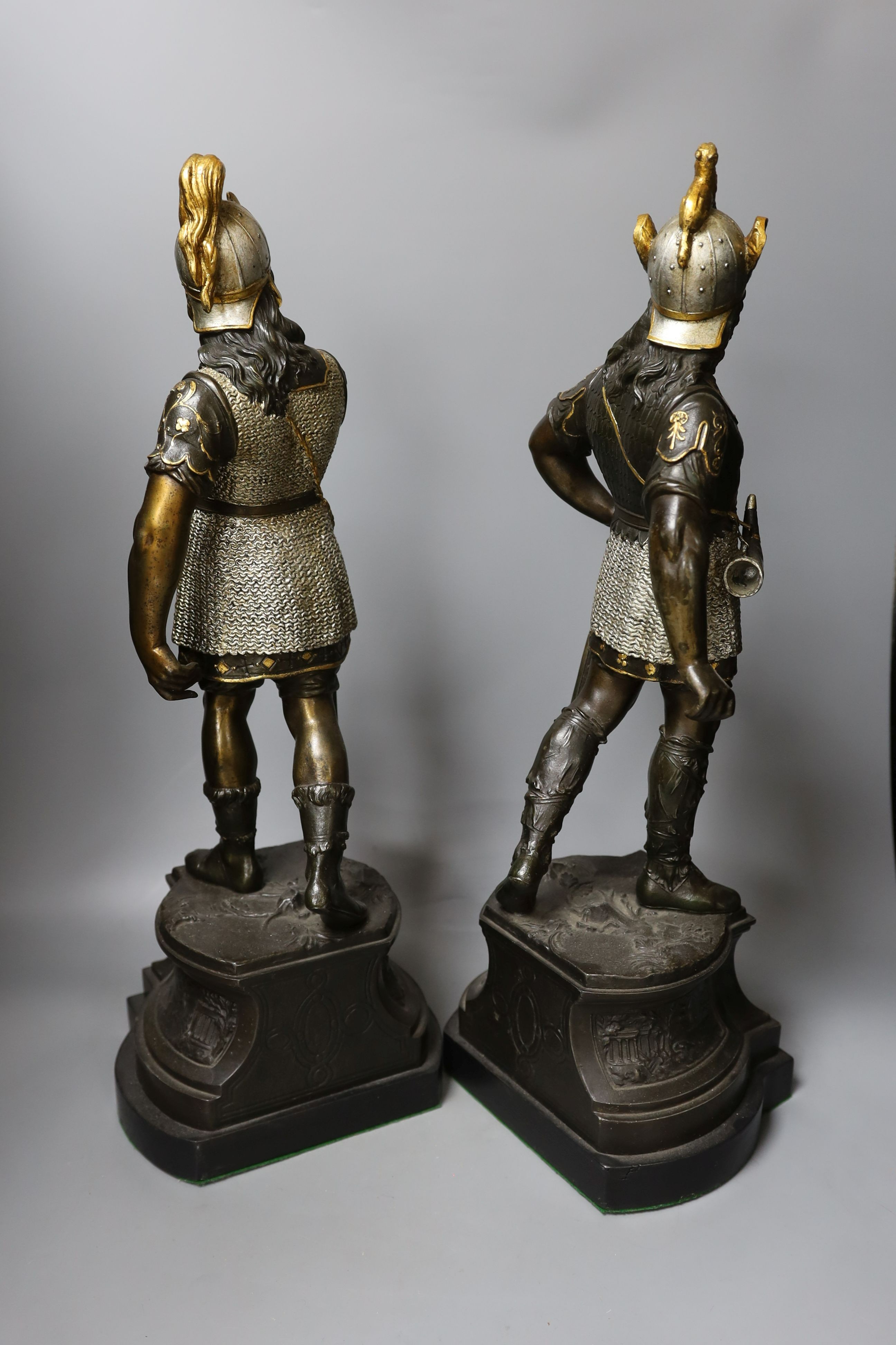 A pair of bronzed spelter gladiator figures - 55cm tall